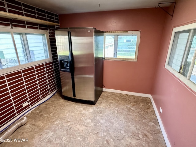 1420 Richards Ave, Williamsport, PA 17701 - detailed view of stainless steel refrigerator with ice dispenser and tile patterned floors