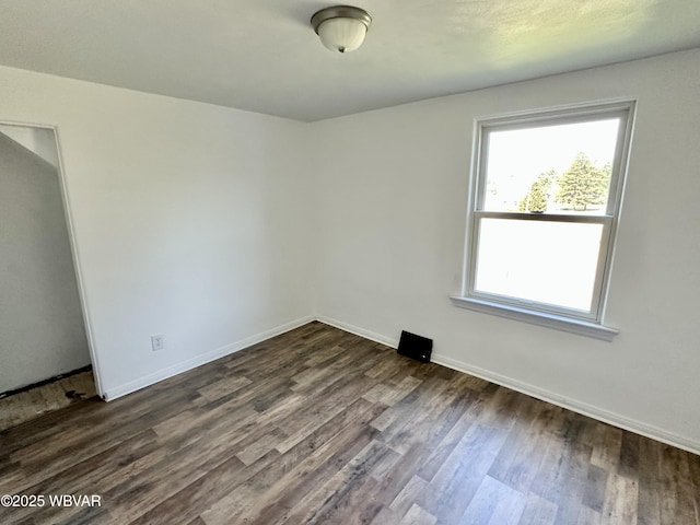 1420 Richards Ave, Williamsport, PA 17701 - spare room featuring dark wood-style floors and baseboards