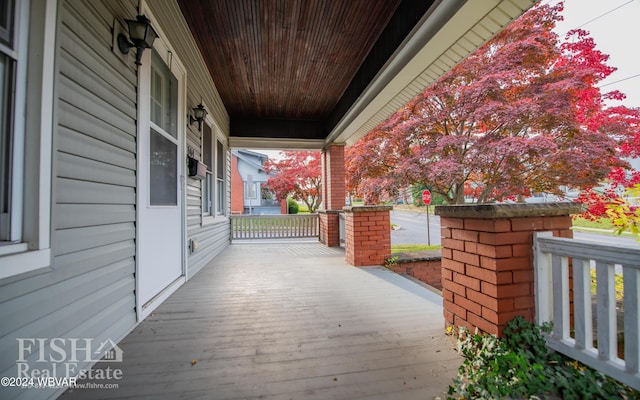 wooden terrace with covered porch