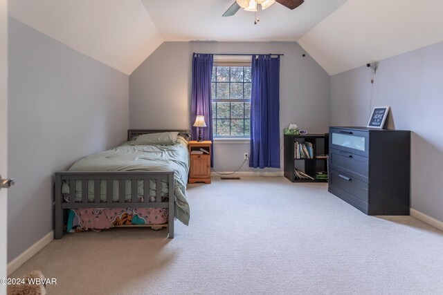 carpeted bedroom featuring ceiling fan and lofted ceiling