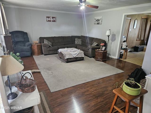 225 Pickwick St, Mill Hall, PA 17751 - living area with dark wood finished floors, crown molding, and ceiling fan