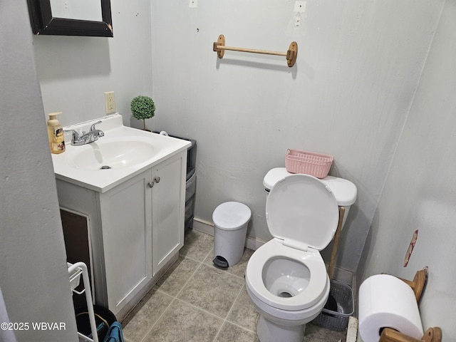 225 Pickwick St, Mill Hall, PA 17751 - half bathroom featuring toilet, vanity, and tile patterned floors