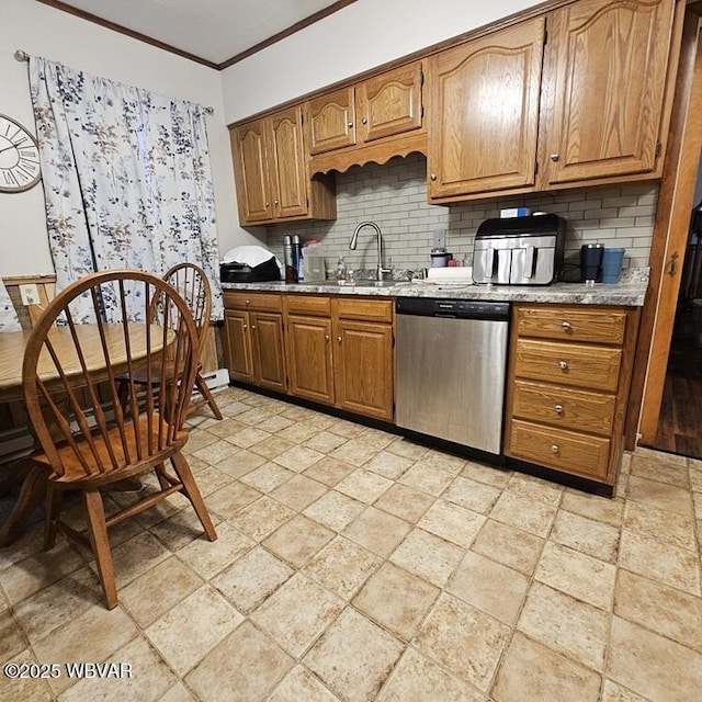 kitchen featuring tasteful backsplash, stone tile floors, ornamental molding, dishwasher, and a sink