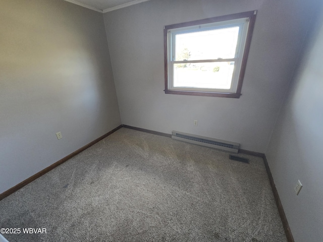 carpeted empty room with baseboard heating