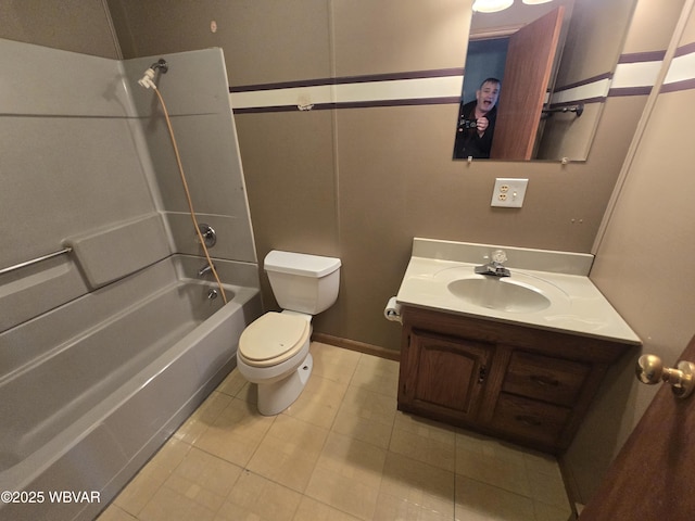 full bathroom with tub / shower combination, toilet, vanity, and tile patterned flooring