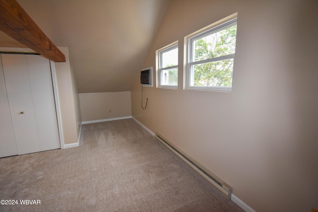 bonus room featuring lofted ceiling with beams, a baseboard radiator, a wall mounted air conditioner, and light carpet