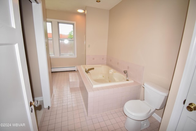 bathroom with baseboard heating, tile patterned flooring, a relaxing tiled tub, and toilet