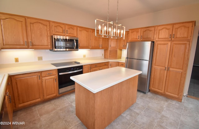 kitchen with pendant lighting, light tile patterned floors, appliances with stainless steel finishes, a notable chandelier, and a kitchen island