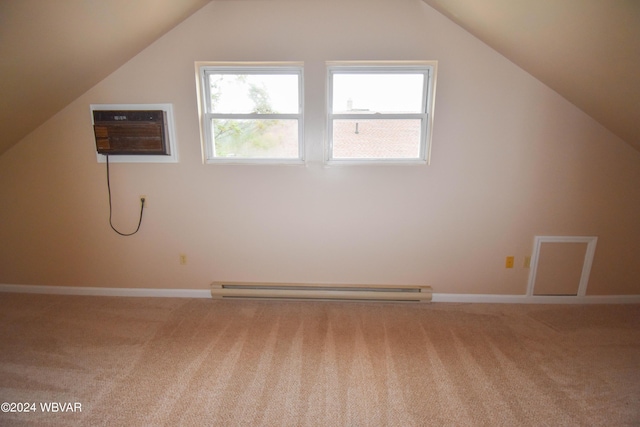 additional living space with a wealth of natural light, carpet floors, and vaulted ceiling