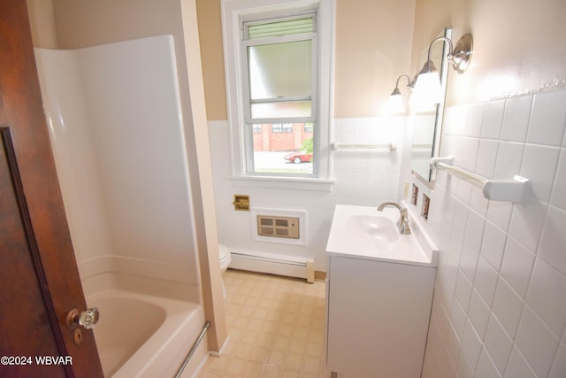 full bathroom featuring vanity, shower / washtub combination, toilet, baseboard heating, and tile walls