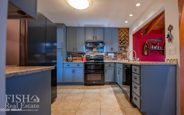 kitchen featuring sink, light tile patterned floors, range hood, black appliances, and decorative backsplash