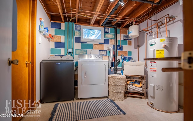 clothes washing area with washing machine and clothes dryer, sink, and electric water heater