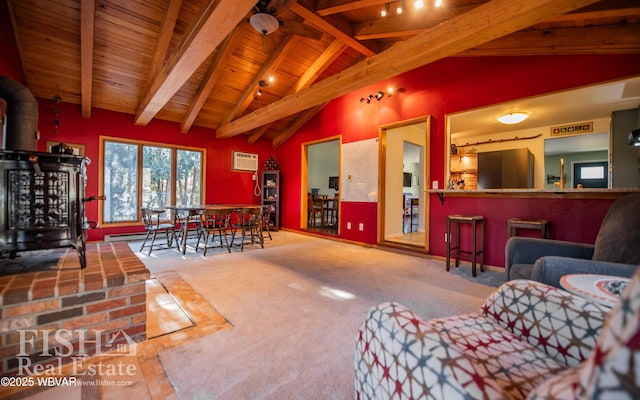 living room featuring vaulted ceiling with beams, carpet, bar area, wooden ceiling, and an AC wall unit