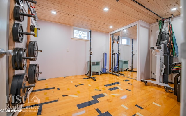 workout room with wood-type flooring and wooden ceiling