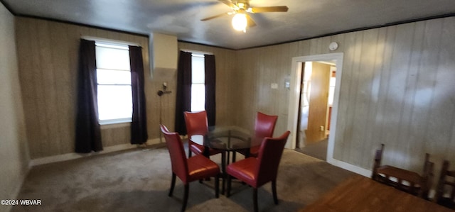 dining space with ceiling fan