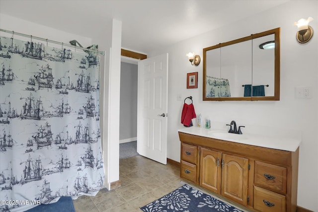 full bath with vanity, a shower with curtain, and tile patterned flooring