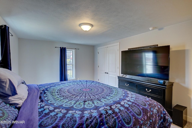 bedroom with a textured ceiling