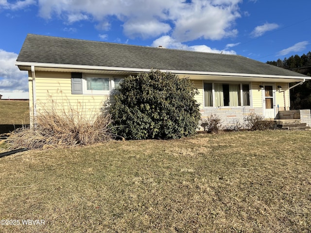 view of property exterior with a yard