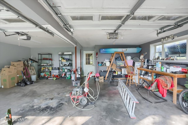 garage featuring a garage door opener