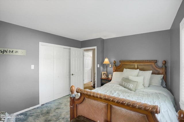 bedroom with carpet floors and a closet