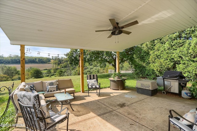 view of patio with ceiling fan, an outdoor hangout area, and area for grilling