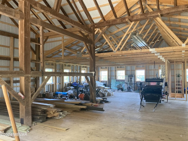 miscellaneous room with high vaulted ceiling