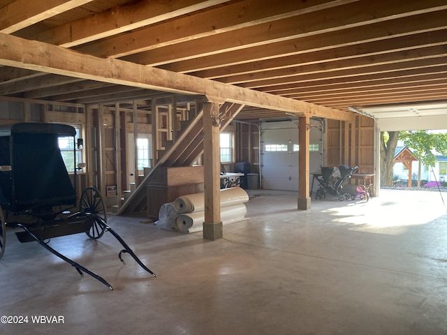 misc room featuring concrete flooring and a healthy amount of sunlight