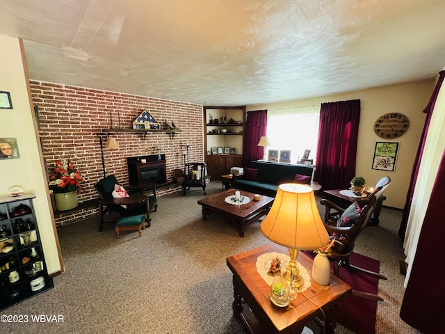 carpeted living room with a wood stove, brick wall, and a textured ceiling