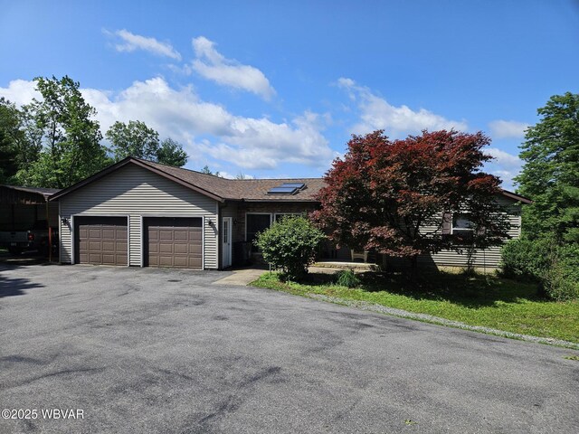 11 Mikes Peak Ln, Lock Haven, PA 17745 - view of front of home featuring an attached garage and asphalt driveway