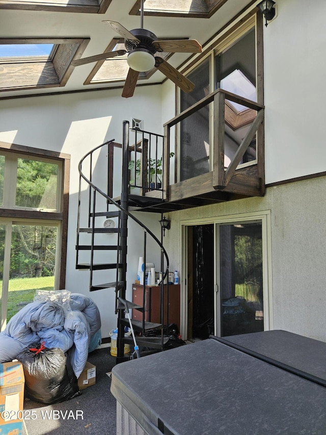 11 Mikes Peak Ln, Lock Haven, PA 17745 - view of side of property with stucco siding, ceiling fan, stairs, and a balcony