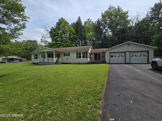 4316 Pine Mountain Rd, Jersey Shore, PA 17740 - ranch-style house with a porch, a front lawn, driveway, and a garage