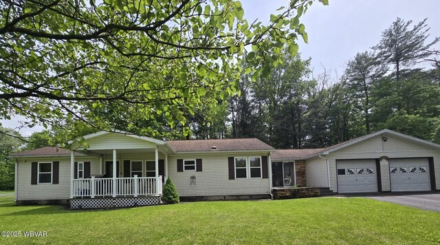 4316 Pine Mountain Rd, Jersey Shore, PA 17740 - ranch-style home with a porch, crawl space, an attached garage, a front lawn, and driveway