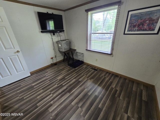4316 Pine Mountain Rd, Jersey Shore, PA 17740 - unfurnished bedroom featuring ornamental molding, dark wood-style floors, and baseboards