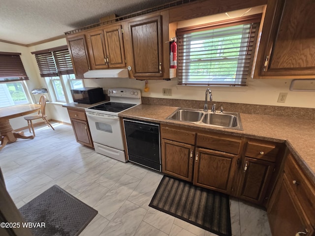 4316 Pine Mountain Rd, Jersey Shore, PA 17740 - kitchen with black appliances, a sink, a textured ceiling, dark countertops, and healthy amount of natural light