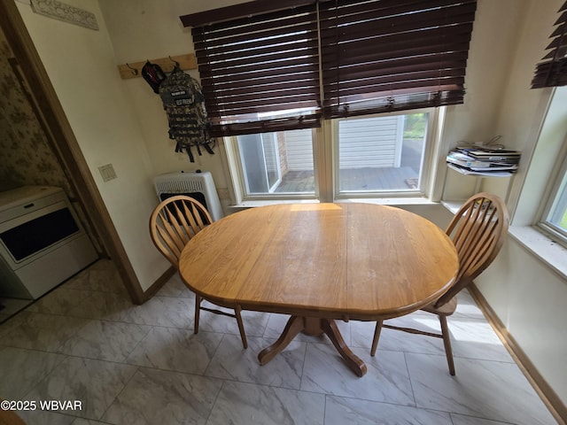 4316 Pine Mountain Rd, Jersey Shore, PA 17740 - dining room featuring marble look tile flooring, baseboards, and washer / dryer