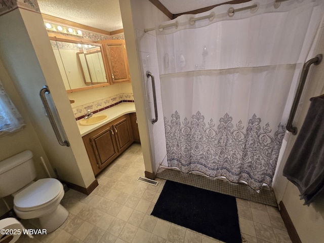 4316 Pine Mountain Rd, Jersey Shore, PA 17740 - bathroom featuring toilet, vanity, a shower with curtain, and a textured ceiling