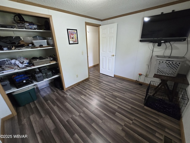 4316 Pine Mountain Rd, Jersey Shore, PA 17740 - home office with dark wood-style floors, crown molding, a textured ceiling, and baseboards