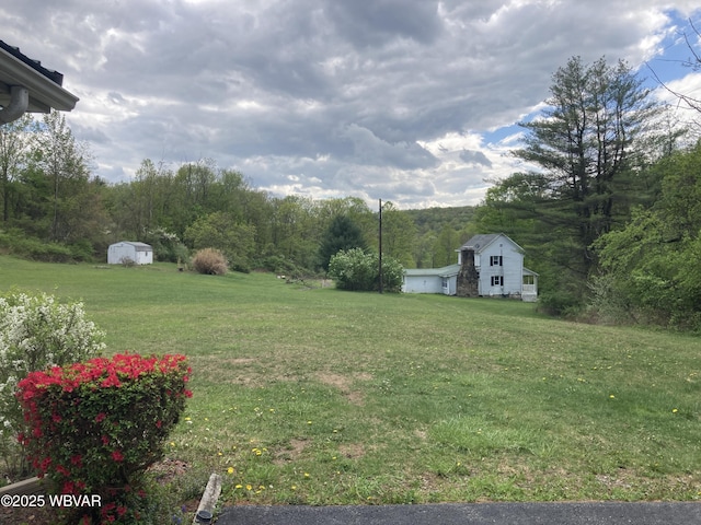 400 Livermore Rd, Williamsport, PA 17701 - view of yard with a storage unit and an outbuilding