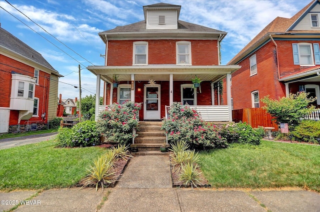 679 2nd Ave, Williamsport, PA 17701 - american foursquare style home with covered porch and brick siding