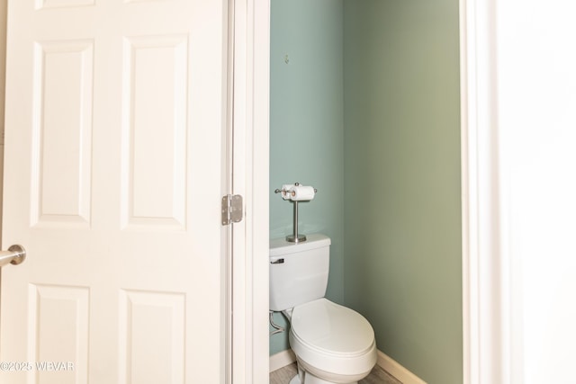 bathroom featuring toilet