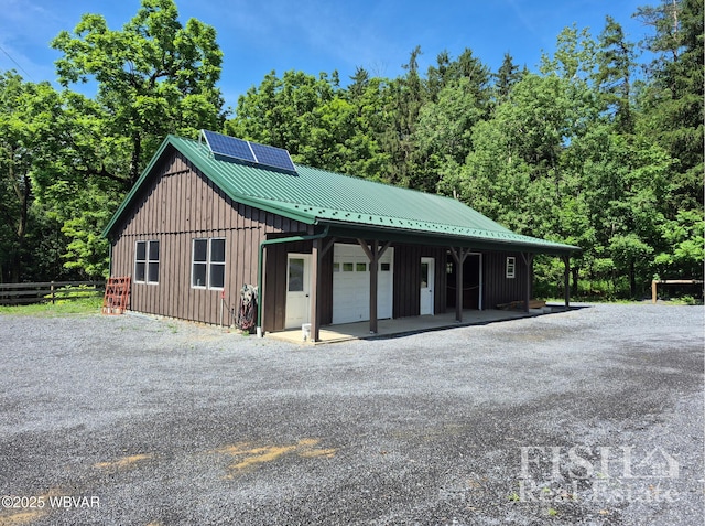 3178 W Winter Rd, Loganton, PA 17747 - view of building exterior with a detached garage and gravel driveway