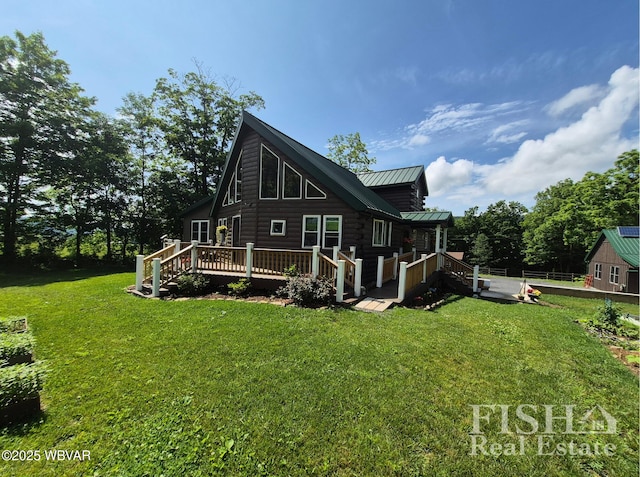 3178 W Winter Rd, Loganton, PA 17747 - back of house with a wooden deck, a lawn, a metal roof, and log siding