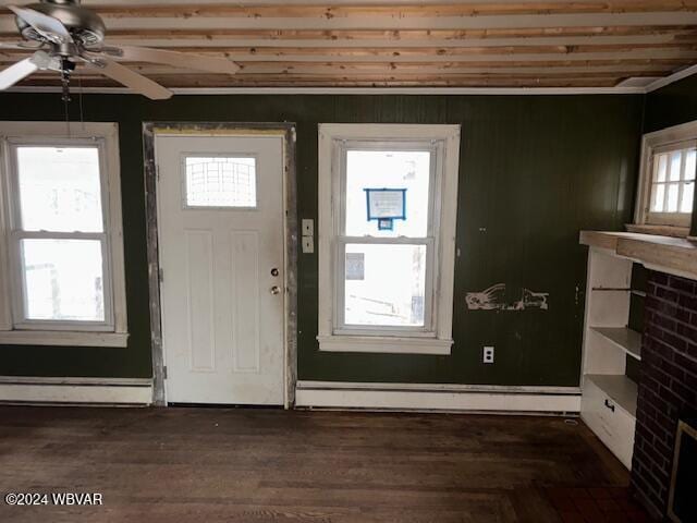 entryway with a baseboard heating unit, ceiling fan, and dark wood-type flooring