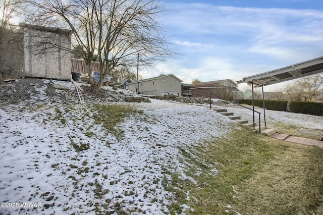 view of yard covered in snow