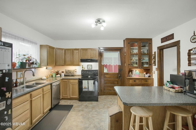 kitchen featuring black range with electric stovetop, sink, stainless steel dishwasher, and a breakfast bar