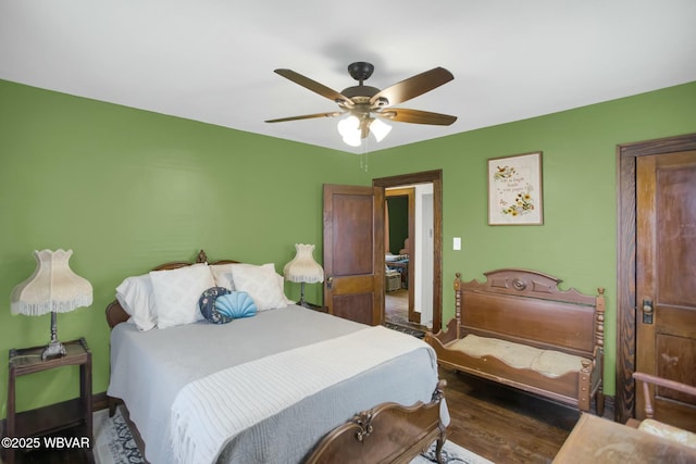 bedroom featuring hardwood / wood-style flooring and ceiling fan