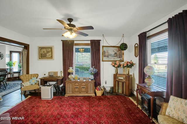 interior space featuring hardwood / wood-style flooring, a healthy amount of sunlight, and ceiling fan