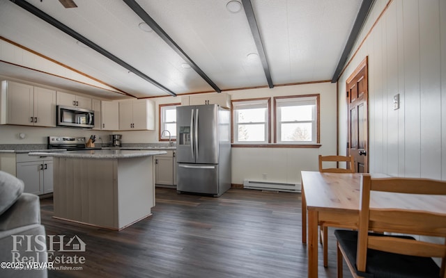 kitchen with lofted ceiling with beams, white cabinets, a center island, baseboard heating, and stainless steel appliances