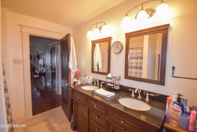 45 W Bald Eagle St, Lock Haven, PA 17745 - bathroom with double vanity and tile patterned flooring
