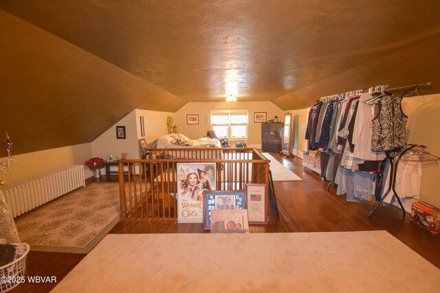 45 W Bald Eagle St, Lock Haven, PA 17745 - additional living space featuring radiator, wood finished floors, lofted ceiling, and baseboards